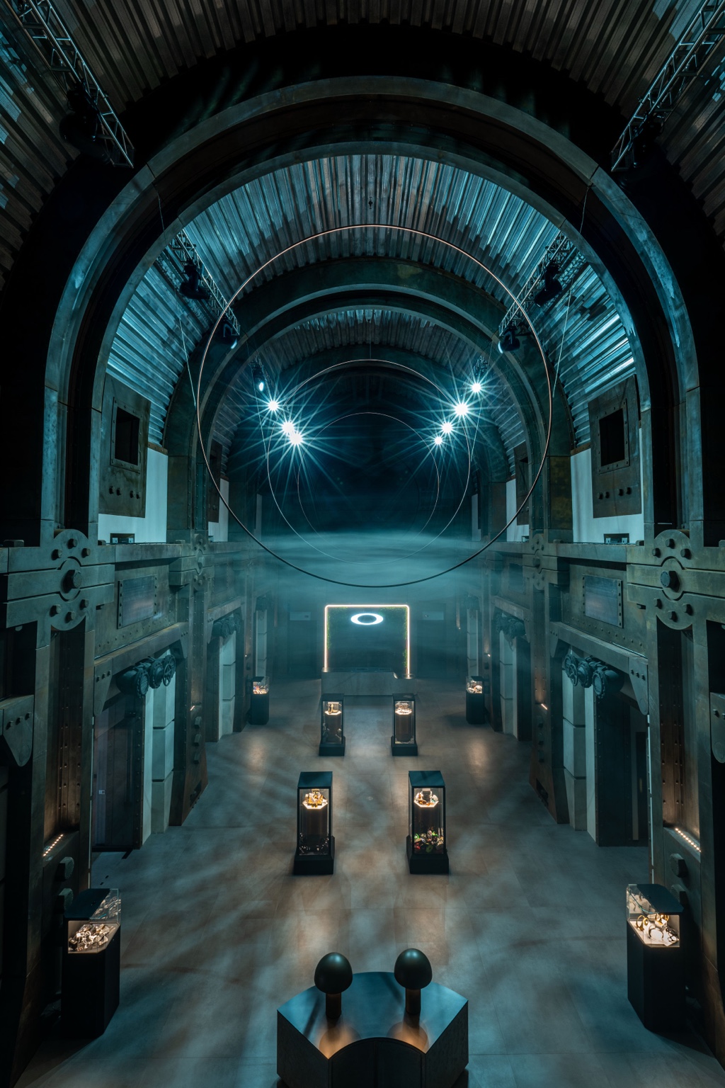 Blue-lit architectural environment and installation